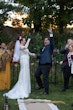 Bride wearing Kern by Maggie Sottero celebrating with her husband