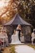 Real Bride wearing rustic boho lace wedding dress called Kendall by Maggie Sottero.