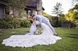 Bride In Lace Fit-And-Flare Wedding Dress Called Giana By Maggie Sottero With Groom