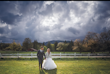 Bride Wearing Ballgown Wedding Dress Called Indiana By Maggie Sottero Holding Hands With Groom