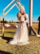 Real Bride in Romantic Sweetheart Neckline Wedding Dress with Floral Lace Motifs Called Hattie Lane Lynette Marie by Rebecca Ingram