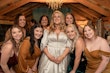 Bride wearing Juniper wedding dress by Sottero and Midgley with her bridesmaids