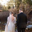 Bride Wearing Boho Sleeved Wedding Dress Called Drita By Maggie Sottero Walking With Groom