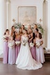 Bride wearing Anniston by Maggie Sottero surrounded by her bridesmaids