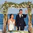 Groom with Bride at Beach Wedding Wearing Sexy Boho Wedding Dress Called Tuscany by Maggie Sottero.