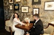 Groom Playing Chess With Bride In A White Long Sleeve Wedding Dress Named Nikki By Maggie Sottero