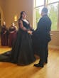 Bride Wearing Black Lace Wedding Dress Called Alexandria By Rebecca Ingram Holding Grooms Hand At The Ceremony