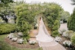 bride in lace crepe sheath wedding dress