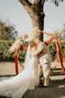 Groom With Bride Wearing Ethereal Beaded Mermaid Bridal Dress Geddes By Maggie Sottero 