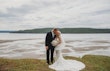 Bride and groom kissing.