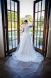 Bride wearing Lorraine Dawn wedding dress by Rebecca Ingram