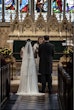 Bride Wearing Chiffon Lace Wedding Dress Called June By Maggie Sottero With Groom At The Ceremony