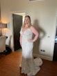 Bride wearing wedding dress called Daxton.