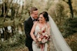 Groom With Bride Wearing Crepe Fit-And-Flare Wedding Dress Juanita Louise By Maggie Sottero