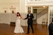 Bride wearing Bailey by Sottero and Midgley dancing with her husband at their reception