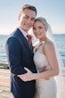 Bride Wearing Beaded Wedding Dress Called Luella By Sottero And Midgley With Groom With The Ocean Behind Them