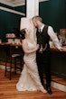 Bride Wearing Rustic Lace Wedding Dress Called Larkin Lynette By Rebecca Ingram Standing With Groom