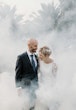 Bride wearing Bethany wedding dress by Rebecca Ingram surrounded by fog