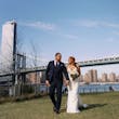 Bride Wearing Lace Crepe Bridal Dress Called Bracken By Sottero And Midgley Walking In A Park With Groom