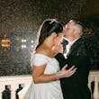 Bride wearing Ekaterina by Maggie Sottero being kissed on the head