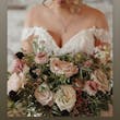 Bride Wearing Lace Beaded Wedding Dress Called Charmaine By Maggie Sottero Holding A Rose Bouquet