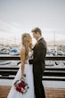 Bride Wearing Sparkly Ballgown Wedding Dress Called Shasta By Sottero And Midgley With Groom At A Marina