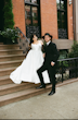 Bride Wearing Simple Aline Wedding Dress Called Selena By Maggie Sottero With Groom Standing On Steps