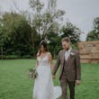 Groom With Bride Wearing Ladonna By Maggie Sottero