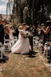 Groom With Bride Wearing Ball Gown With Shimmery Lace Motifs Valona By Sottero And Midgley