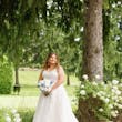 Bride Wearing Beaded Wedding Dress Called Marvine By Sottero And Midgley In A Garden
