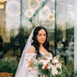 Bride Wearing Sexy Lace Wedding Dress Called Fiona By Maggie Sottero Holding A White Bouquet With Orange Berries