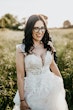 Bride Wearing Lace Ballgown Wedding Dress Called Mavis By Rebecca Ingram