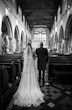 Bride Wearing Chiffon Lace Wedding Dress Called June By Maggie Sottero Walking Down The Aisle With Father