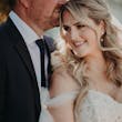 Bride Wearing Off-The-Shoulder Lace Wedding Dress Called Carson By Sottero And Midgley With Groom
