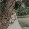 Bride Wearing Modest Cap Sleeve Ball Gown Pearson By Maggie Sottero