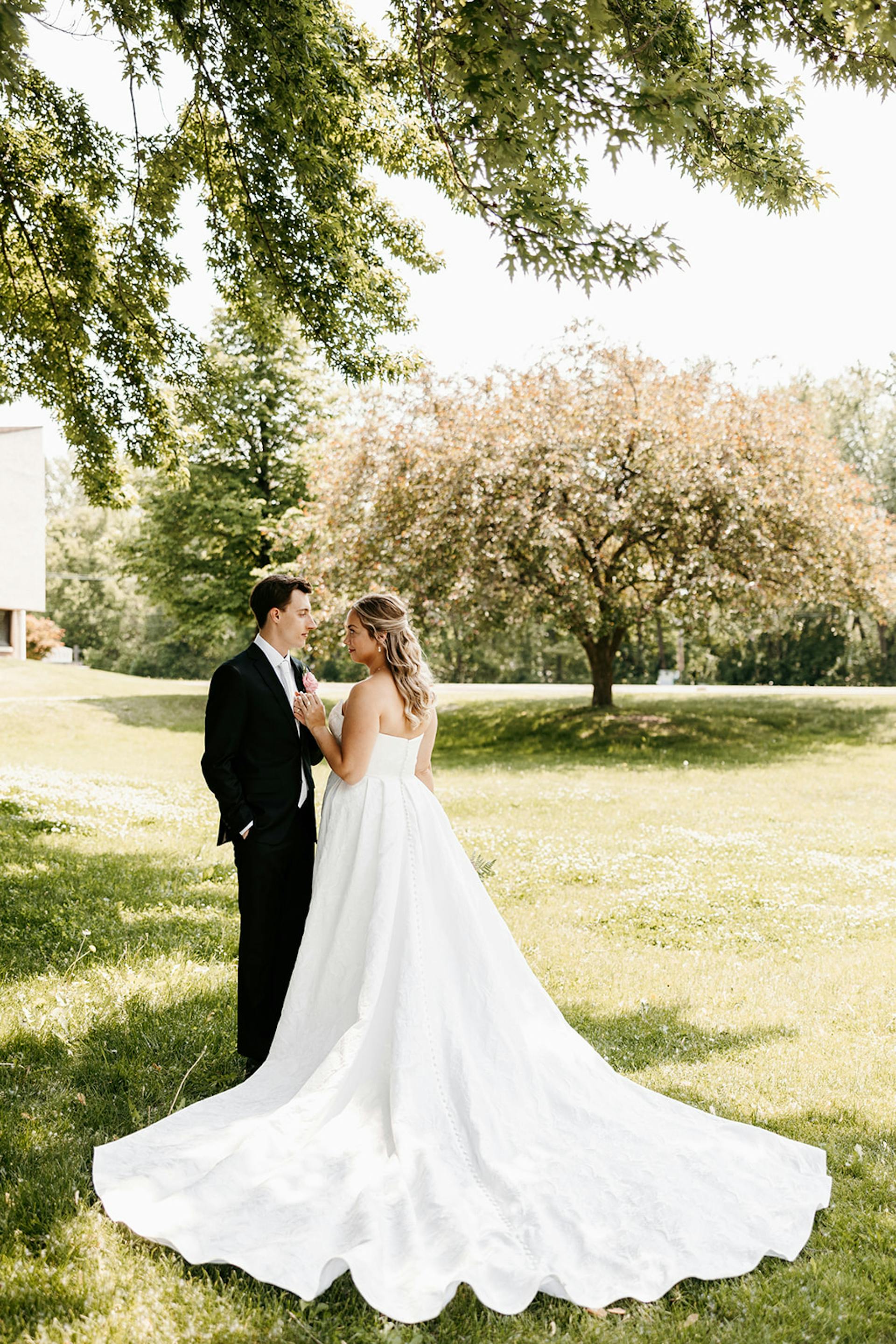 Bride Wearing Jacquard Ballgown Wedding Dress Called Aspen Marie By Sottero And Midgley Looking At Groom