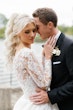 Bride Wearing Lace Princess Wedding Dress Called Norvinia By Sottero And Midgley With Groom Holding Her