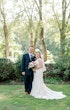 Groom and Bride Wearing a Classic Lace Wedding Dress Called Brenda by Rebecca Ingram