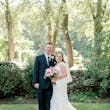 Groom and Bride Wearing a Classic Lace Wedding Dress Called Brenda by Rebecca Ingram