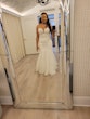 Bride Wearing Sexy Lace Wedding Dress Called Lennon By Maggie Sottero Looking In The Mirror