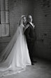 Real Bride in Mikado A-Line Bridal Dress with Plunging V-Neckline Called Raven Marie by Maggie Sottero