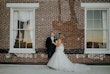 Bride wearing Danielle by Maggie Sottero with her husband