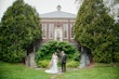 Groom With Bride Wearing Lace Fit-And-Flare Daphne By Rebecca Ingram 