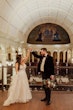 Groom with Bride in Dreamy Beaded Floral Lace A-Line Wedding Dress Called Laramie by Sottero & Midgley