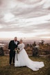 Plus Size Bride Wearing Lace Princess Wedding Dress Called Mallory Dawn By Maggie Sottero With Groom