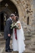 Bride Wearing Chiffon Lace Wedding Dress Called June By Maggie Sottero Kissing Groom