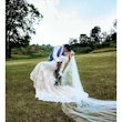 Groom With Bride Wearing Long Sleeved Lace Fit And Flair Dakota By Sottero And Midgley 