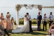 Groom With Bride Wearing A-Line Lace Wedding Dress Marisol By Rebecca Ingram