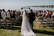 Groom With Bride Wearing A-Line Lace Wedding Dress Marisol By Rebecca Ingram