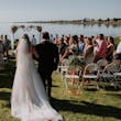 Groom With Bride Wearing A-Line Lace Wedding Dress Marisol By Rebecca Ingram